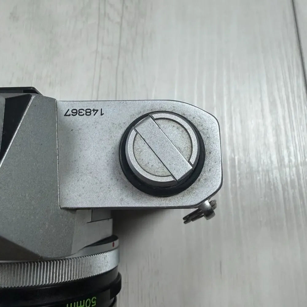 Canon TX 35mm SLR Film Camera with Canon FD 50mm f/1.8 Lens – Parts or Repair